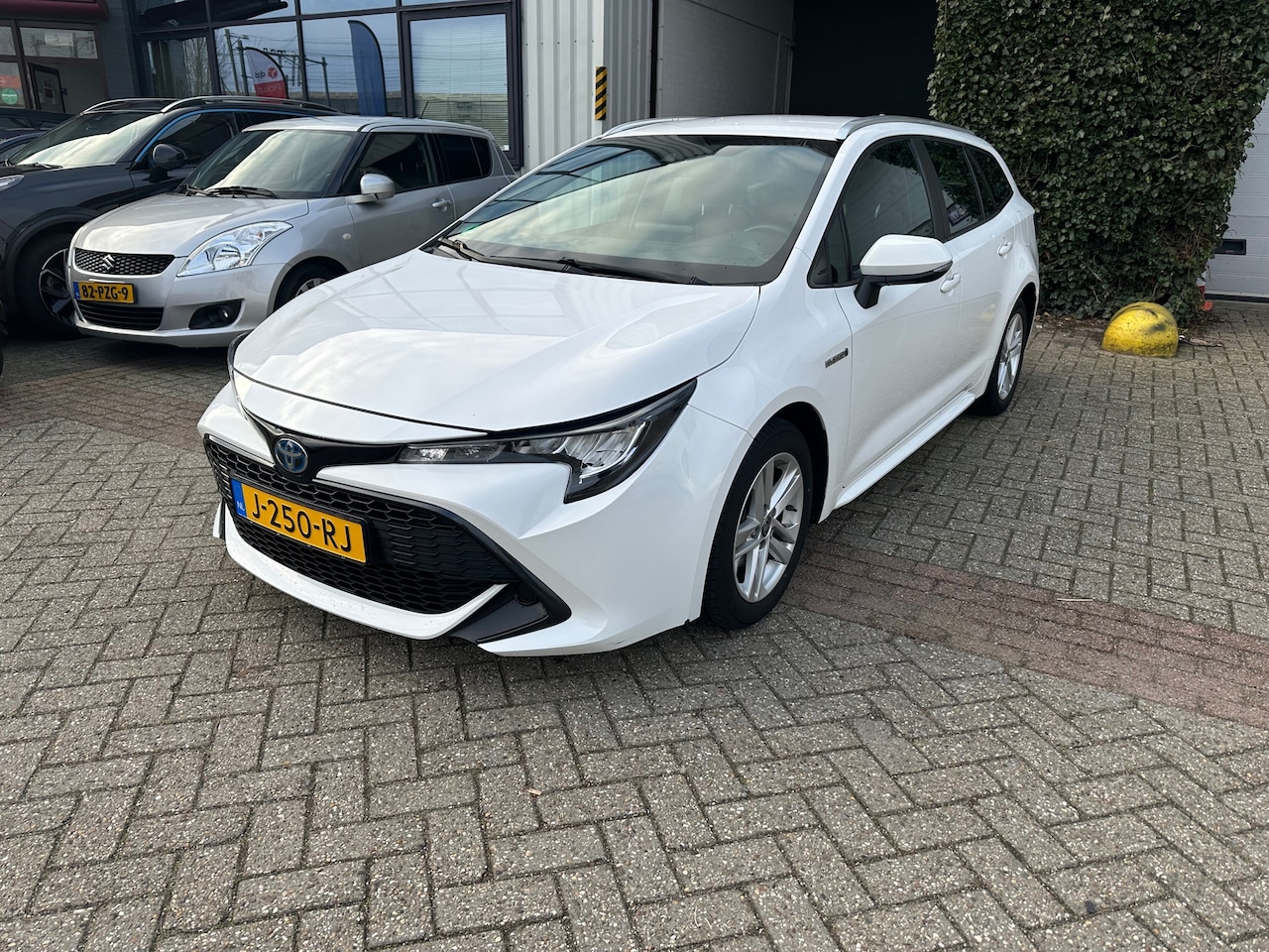 Toyota Corolla Touring Sports - 1.8 Hybrid Active 1.8 Hybrid Active - AutoWereld.nl