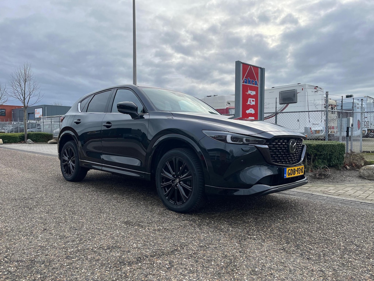 Mazda CX-5 - 2.0 e-SkyActiv-G M Hybrid 165 Homura Black Edition | Adap. Cruise Control | BOSE | Carplay - AutoWereld.nl