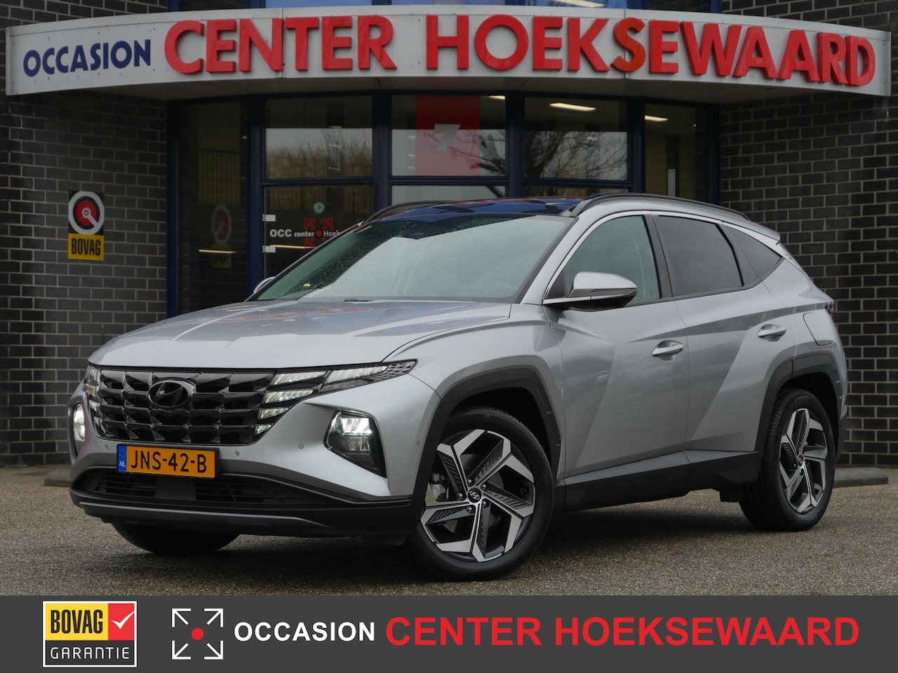 Hyundai Tucson - 1.6 T-GDi HEV 230pk Premium Sky | Shimmering Silver | Panoramadak | - AutoWereld.nl