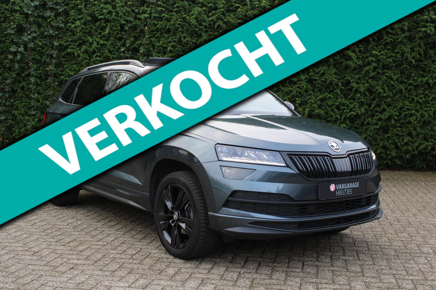 Skoda Karoq - 1.5 TSI ACT Sportline Business stand verwarming - AutoWereld.nl