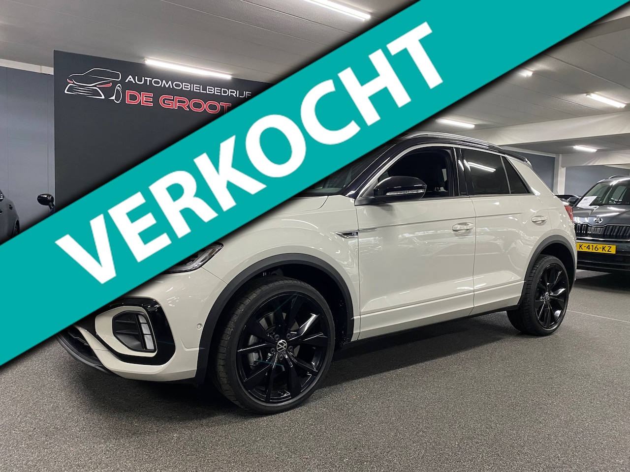 Volkswagen T-Roc - 1.5 TSI Sport Business R/ Automaat/ Parkeersensoren/ Achteruitrijcamera/ 110KW - AutoWereld.nl