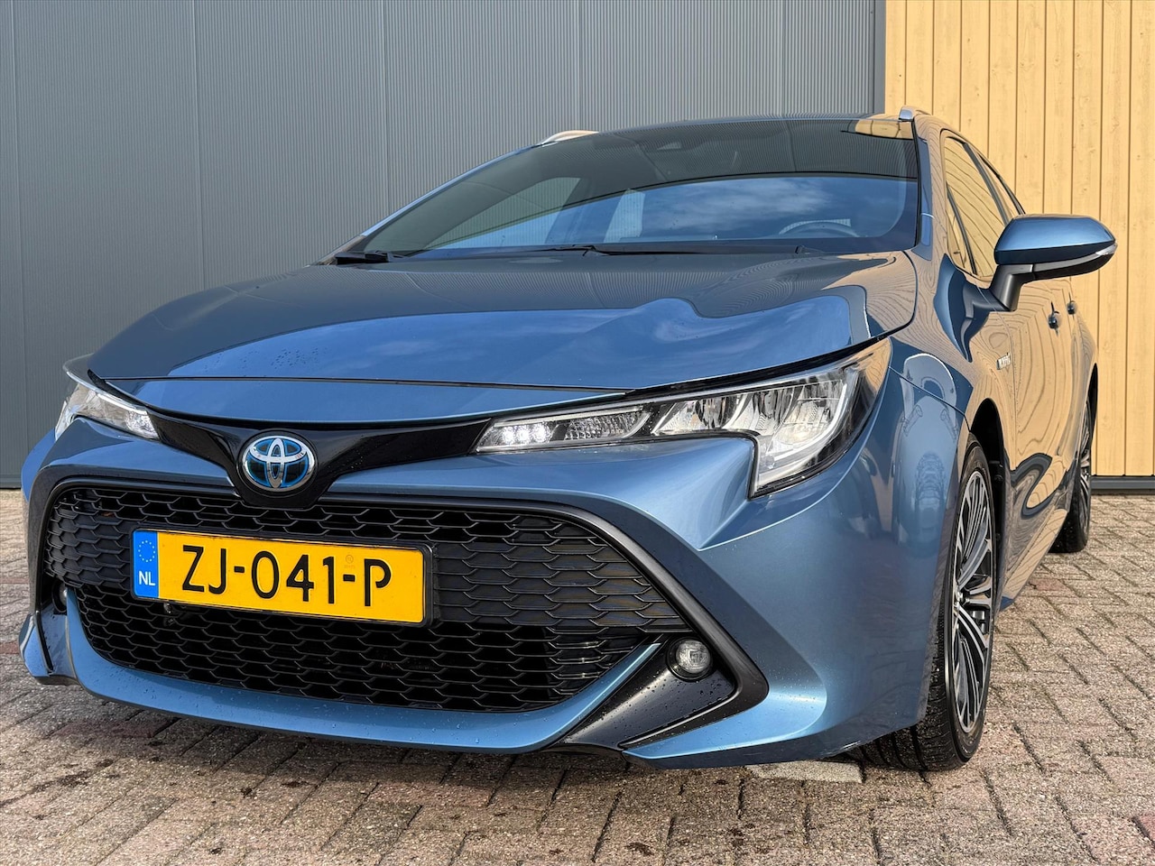 Toyota Corolla Touring Sports - 1.8 Hybrid 122pk CVT First Edition | ACC | Carplay | Clima | Navi | - AutoWereld.nl