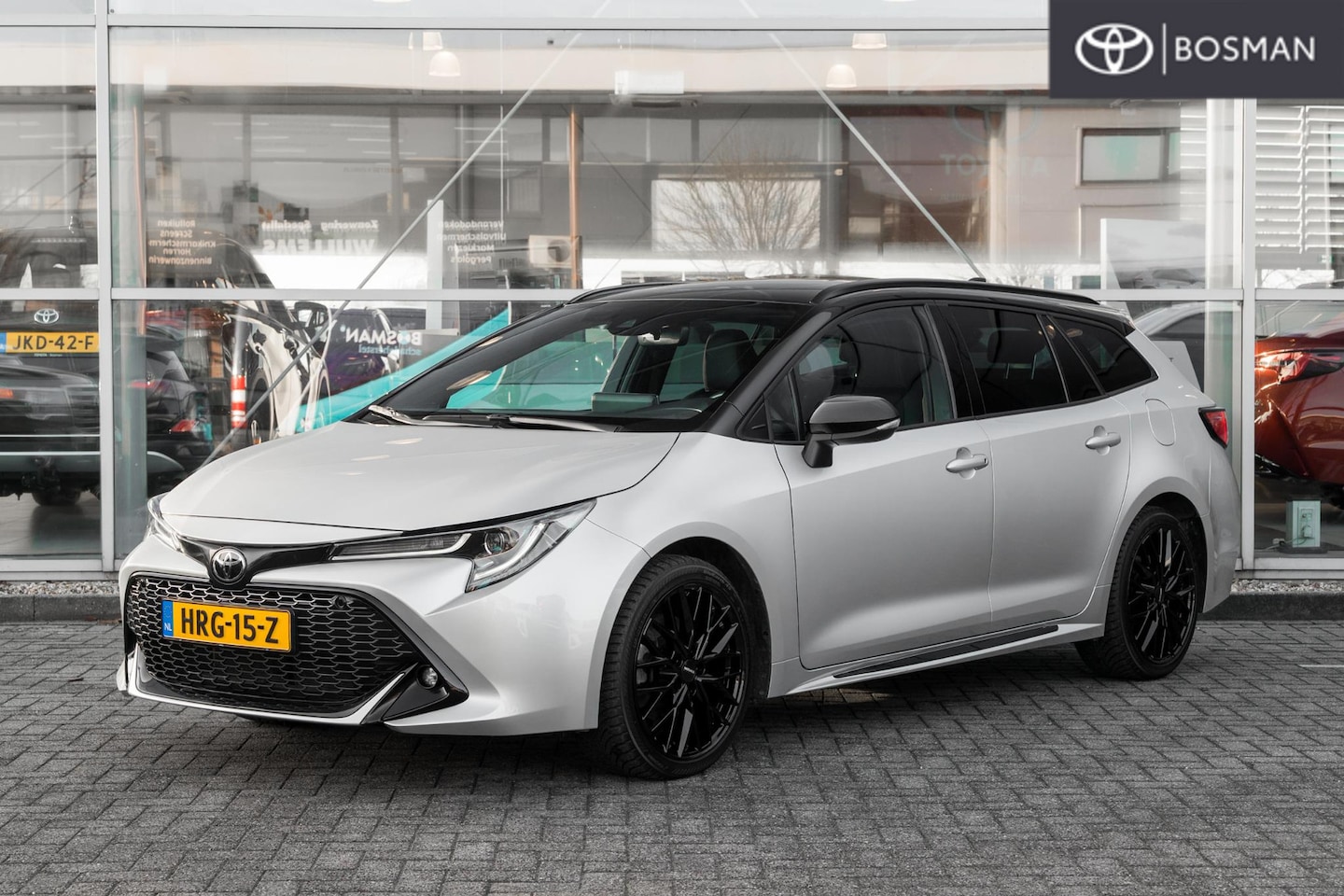 Toyota Corolla Touring Sports - 2.0 Hybrid GR-Sport LEER | ALL-SEASON - AutoWereld.nl