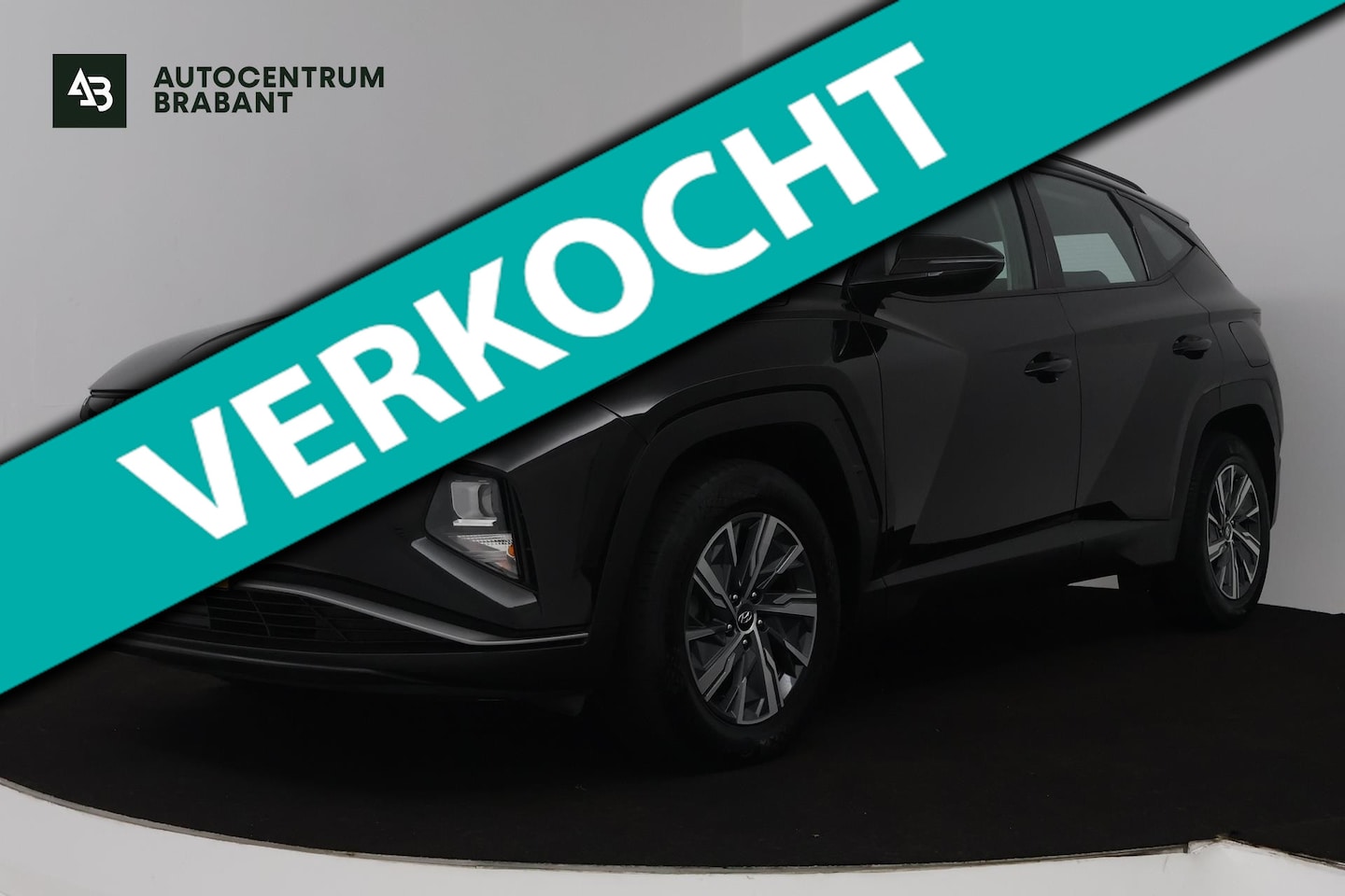 Hyundai Tucson - 1.6 T-GDI HEV i-Motion (TREKHAAK, ACHTERUITRIJCAMERA, DIGITALE COCKPIT, PARKEERSENSOREN) - AutoWereld.nl