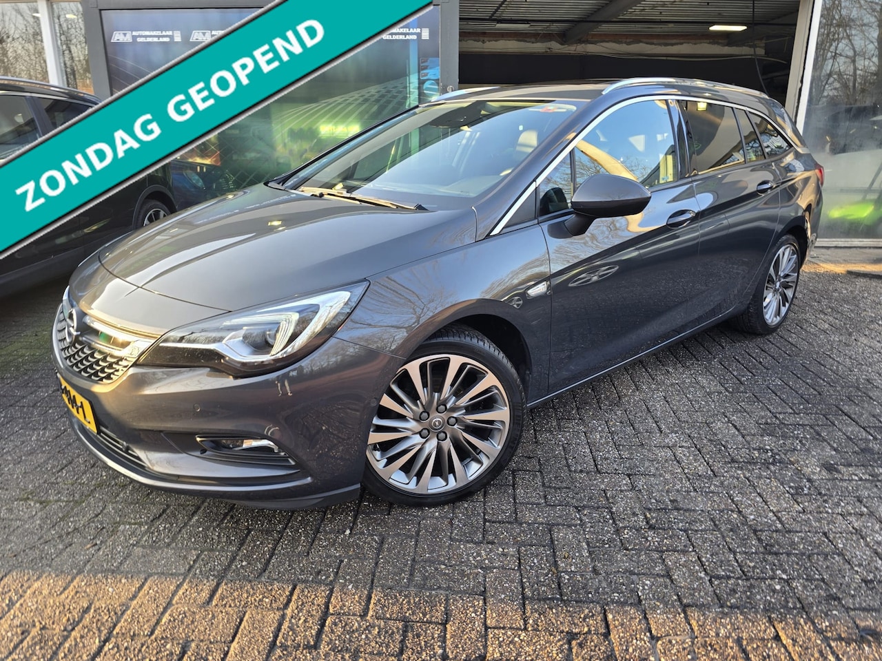 Opel Astra Sports Tourer - 1.4 Innovation | 2E EIGENAAR | 12MND GARANTIE | SCHUIF DAK | CAMERA | CARPLAY | - AutoWereld.nl
