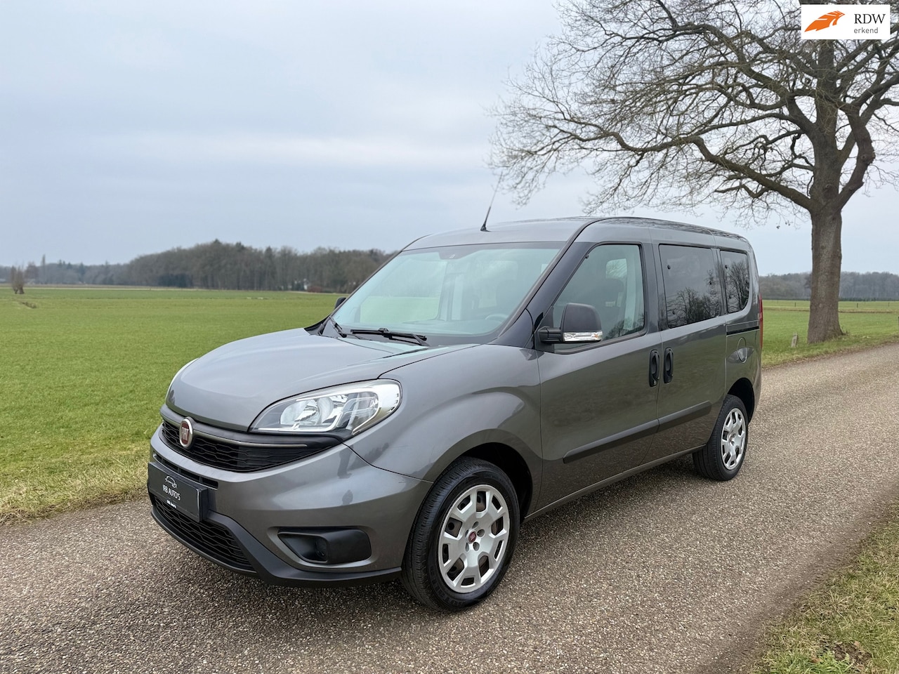 Fiat Doblò - 1.4 / 7PERS / AIRCO / NIEUWE APK - AutoWereld.nl