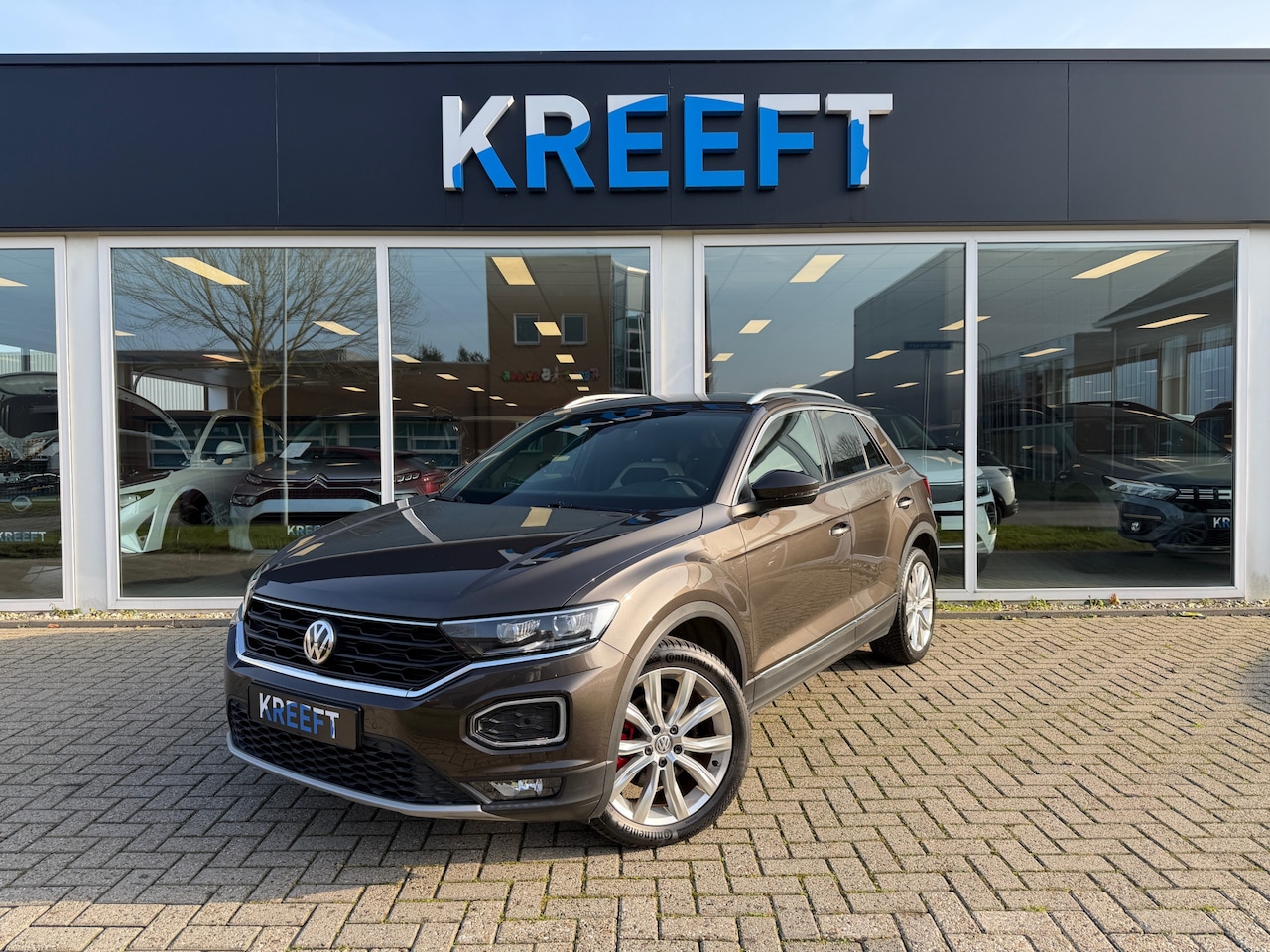 Volkswagen T-Roc - 1.5 TSI Sport Stuur/Stoelverwarming - AutoWereld.nl