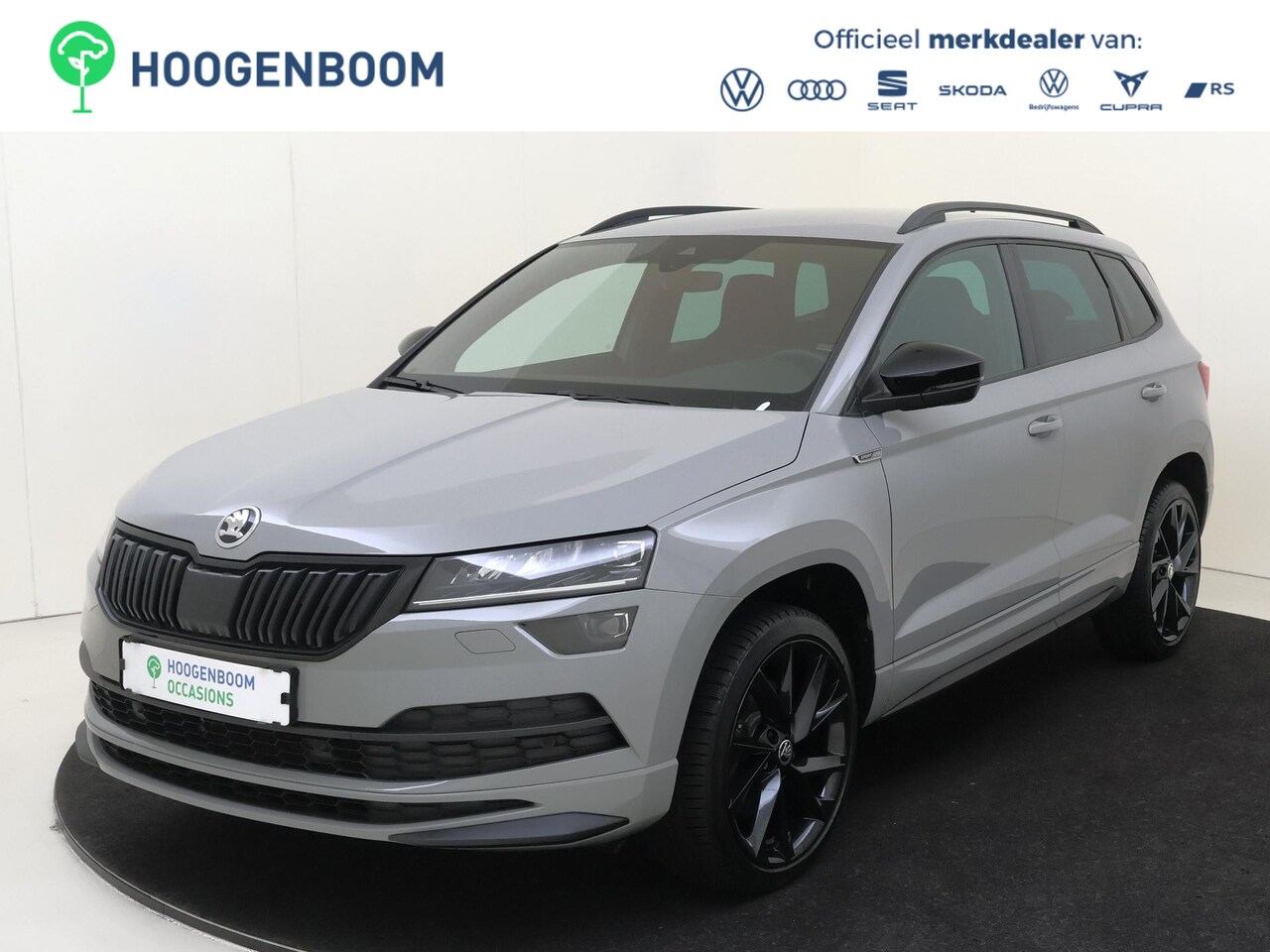 Skoda Karoq - 1.5 TSI ACT Sportline Business | Achteruitrijcamera | Dodehoek detectie | Keyless | Adapti - AutoWereld.nl