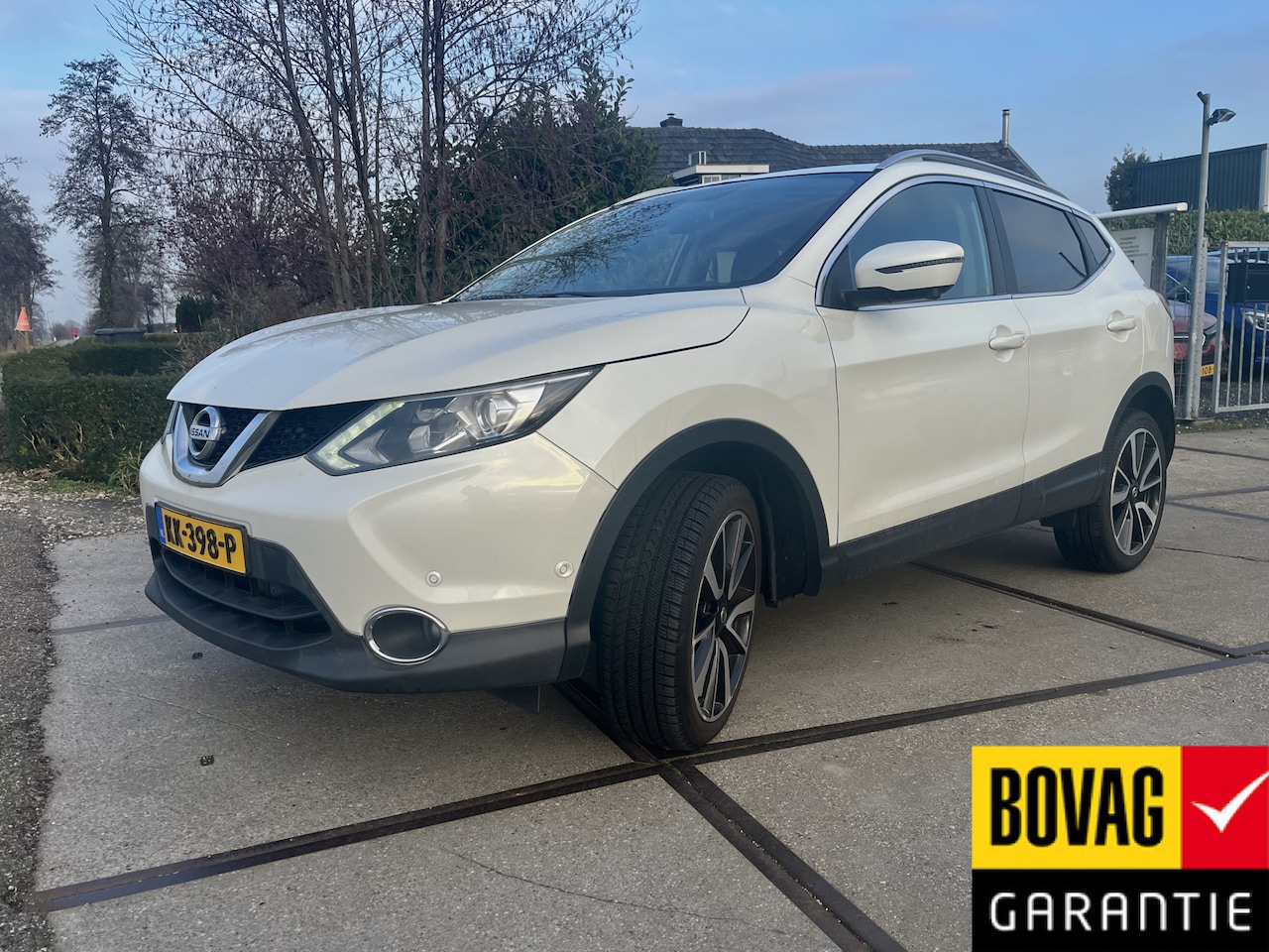 Nissan Qashqai - 1.2 Tekna Lederen bekleding | trekhaak | rondom camera - AutoWereld.nl
