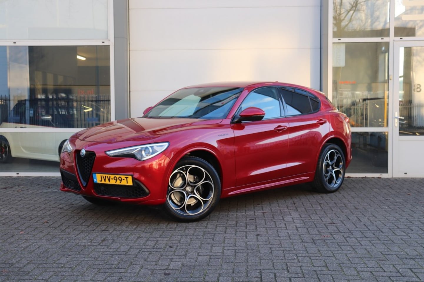 Alfa Romeo Stelvio - 2.0 T AWD 280PK VELOCE/ROSSO.COMP/A.CARPLAY/SPORTLEDER/AD.CR - AutoWereld.nl