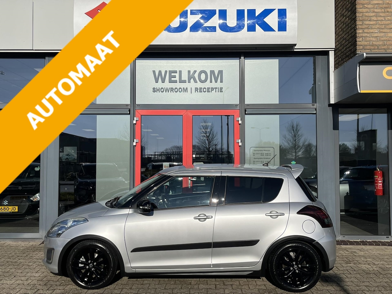 Suzuki Swift - 1.2 94pk 5D Automaat Exclusive Sport (RIJKLAARPRIJS) - AutoWereld.nl