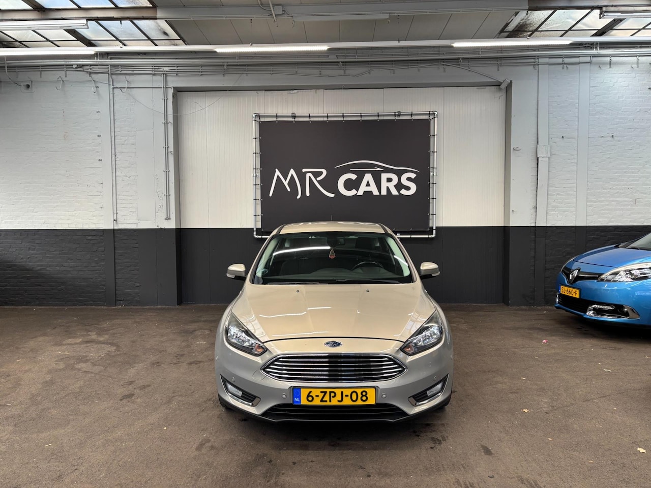 Ford Focus - 1.0 Titanium Edition Navi/Parkeerhulp/Cruise Control - AutoWereld.nl