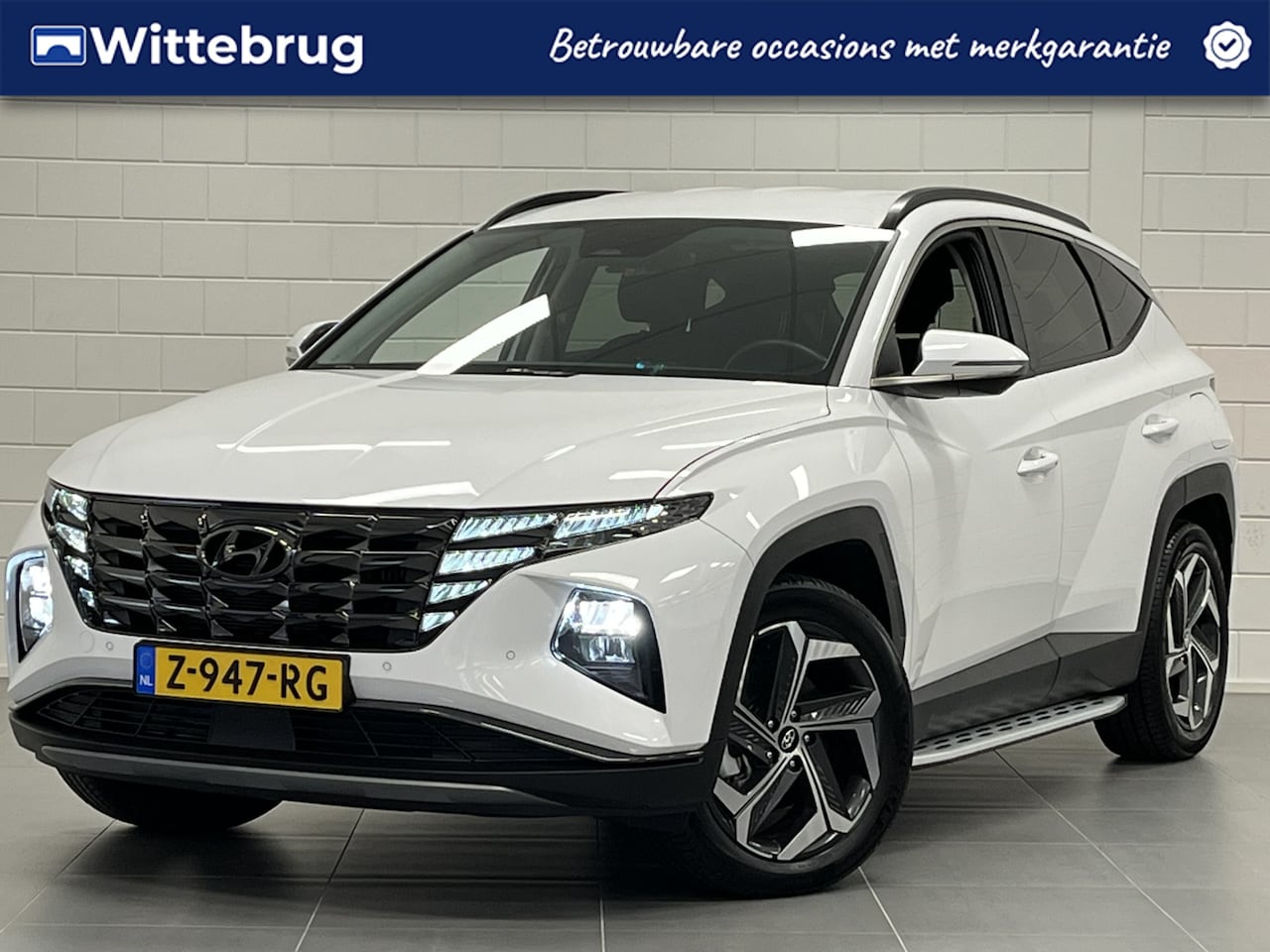 Hyundai Tucson - 1.6 T-GDI PHEV Comfort 4WD FULL LED | 19 INCH | SIDE BARS | STOELVERWARMING - AutoWereld.nl