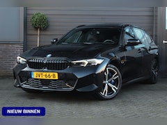 BMW 3-serie Touring - 330e | Panoramadak | M Schaalstoelen | H+K | HUD | Adaptieve cruise Control | LED | 19 Inc