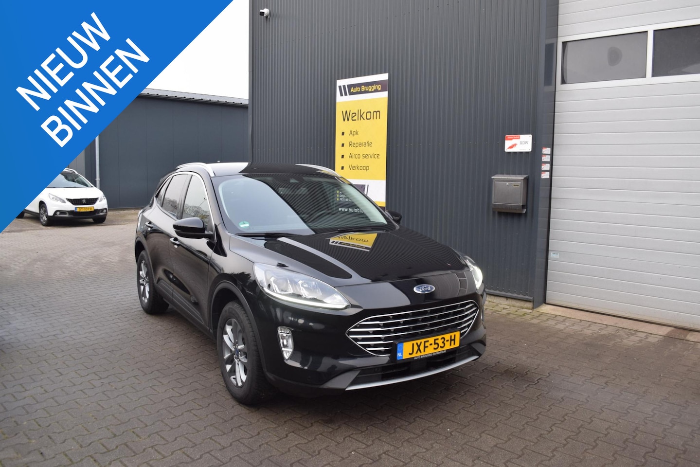 Ford Kuga - 2.5 PHEV Titanium 2.5 PHEV Titanium - AutoWereld.nl