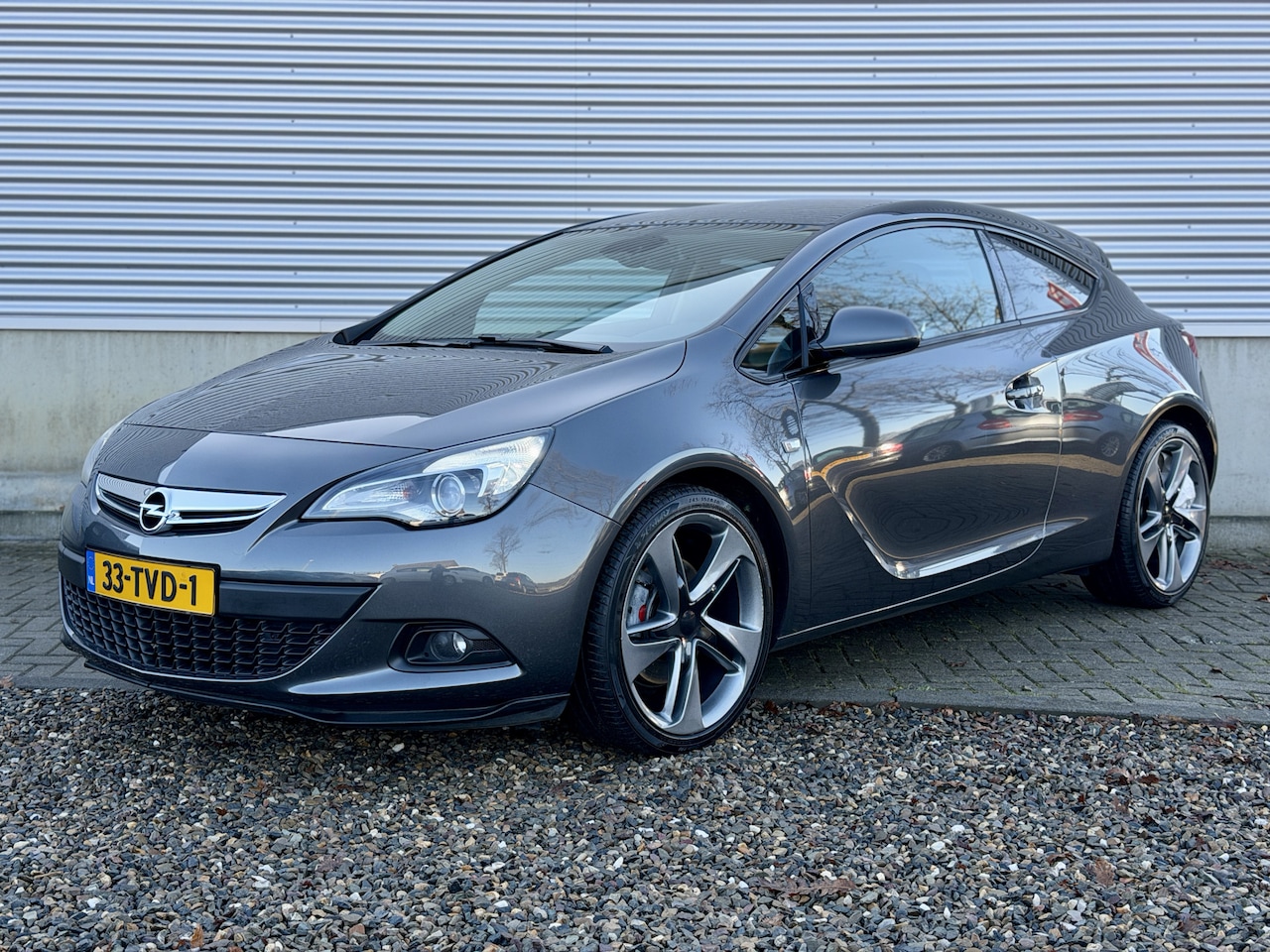 Opel Astra GTC - 1.4 Turbo Sport [ fm navi,ecc,cruise,19``lmv ] - AutoWereld.nl