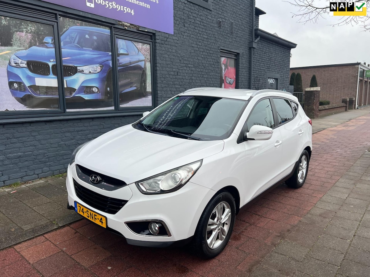 Hyundai ix35 - 1.6i GDI Business Edition navi camera nap nl auto - AutoWereld.nl
