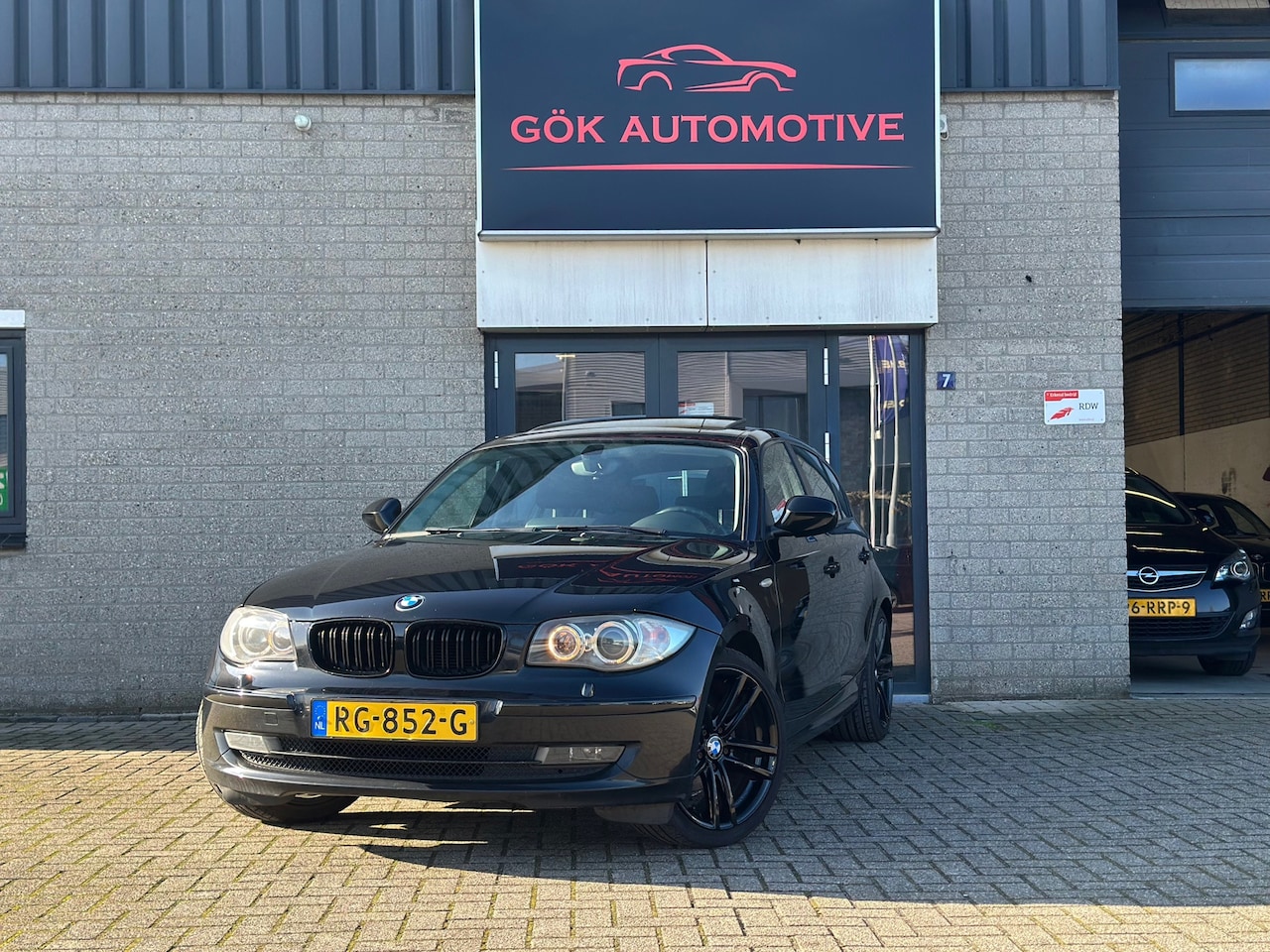 BMW 1-serie - 116i EffDyn. Ed. Business Line Ultimate Edition / Xenon / Schuifdak / PDC / Stoelverwarmin - AutoWereld.nl