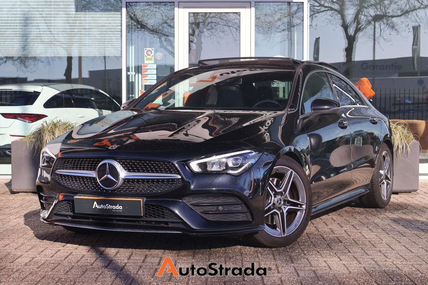 Mercedes-Benz CLA-Klasse - Coupé 200 AMG-Line 163pk | Camera | Pano | Cruise | Climate | Stoelverwarming | Sfeer | - AutoWereld.nl