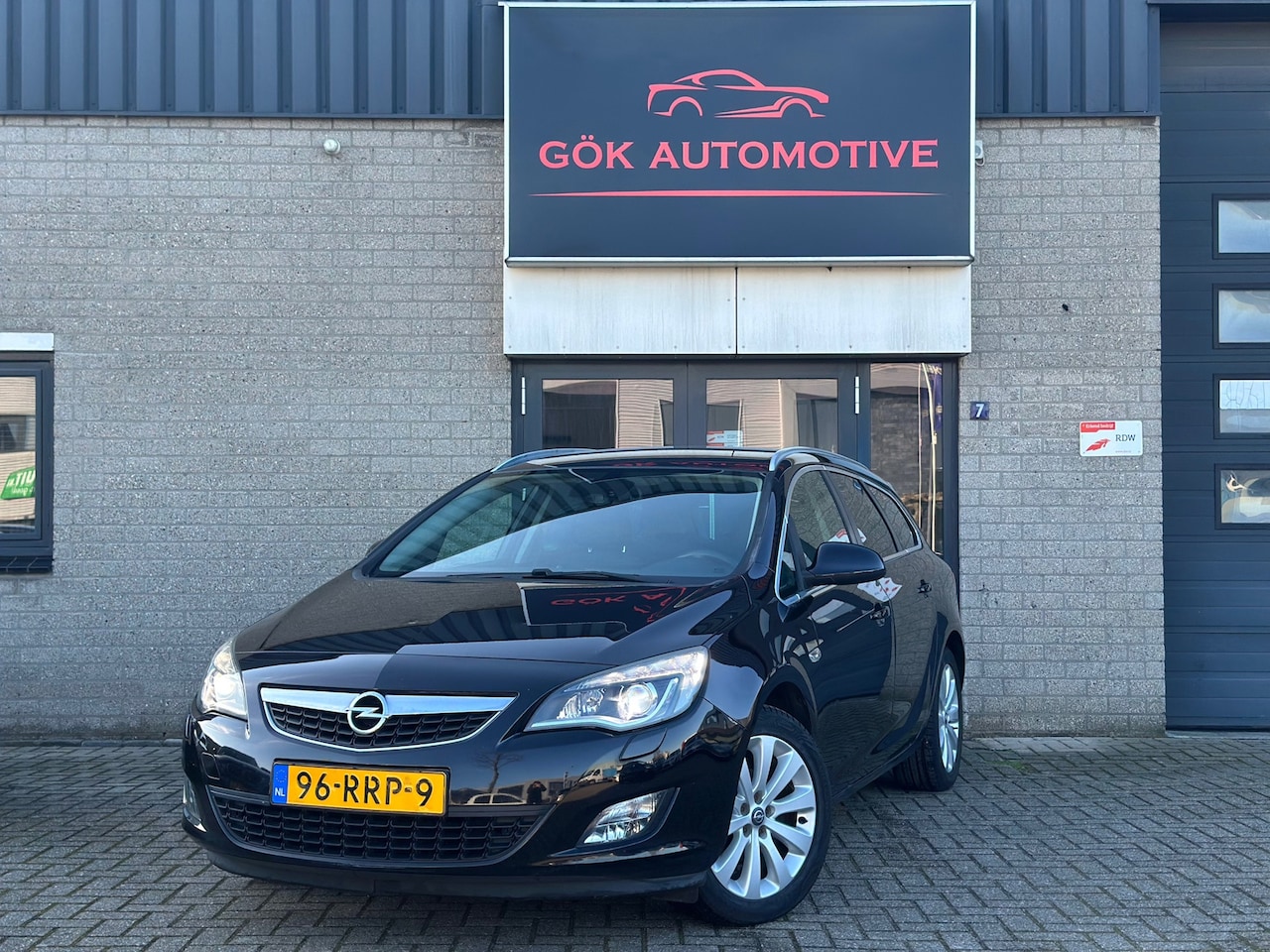 Opel Astra Sports Tourer - 1.4 Turbo Cosmo / Navi / Xenon / Led / PDC / NAP / Cruise Control - AutoWereld.nl