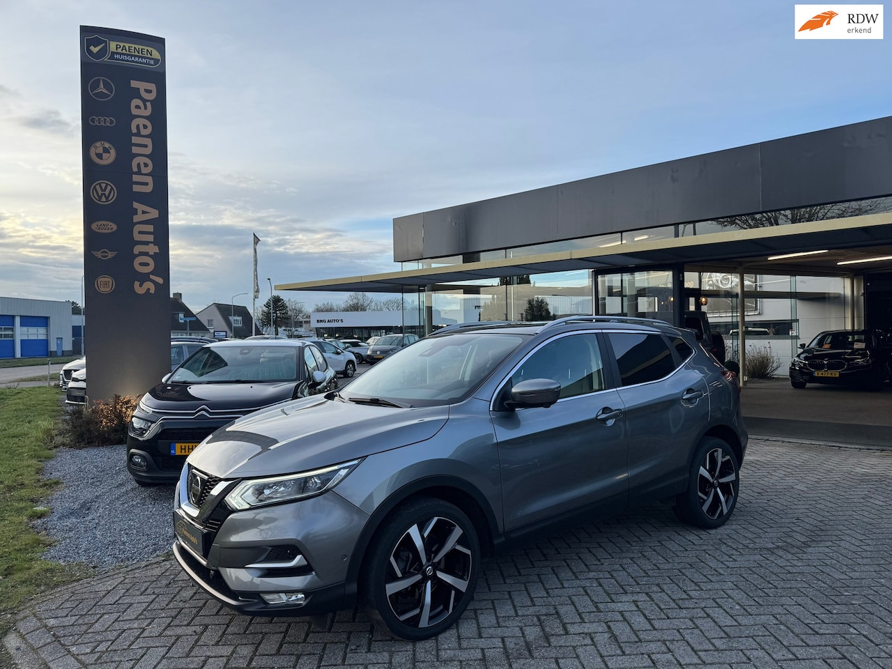 Nissan Qashqai - 1.2 Tekna|360gr Cam|Nav|Stoelverw.|Keyless - AutoWereld.nl