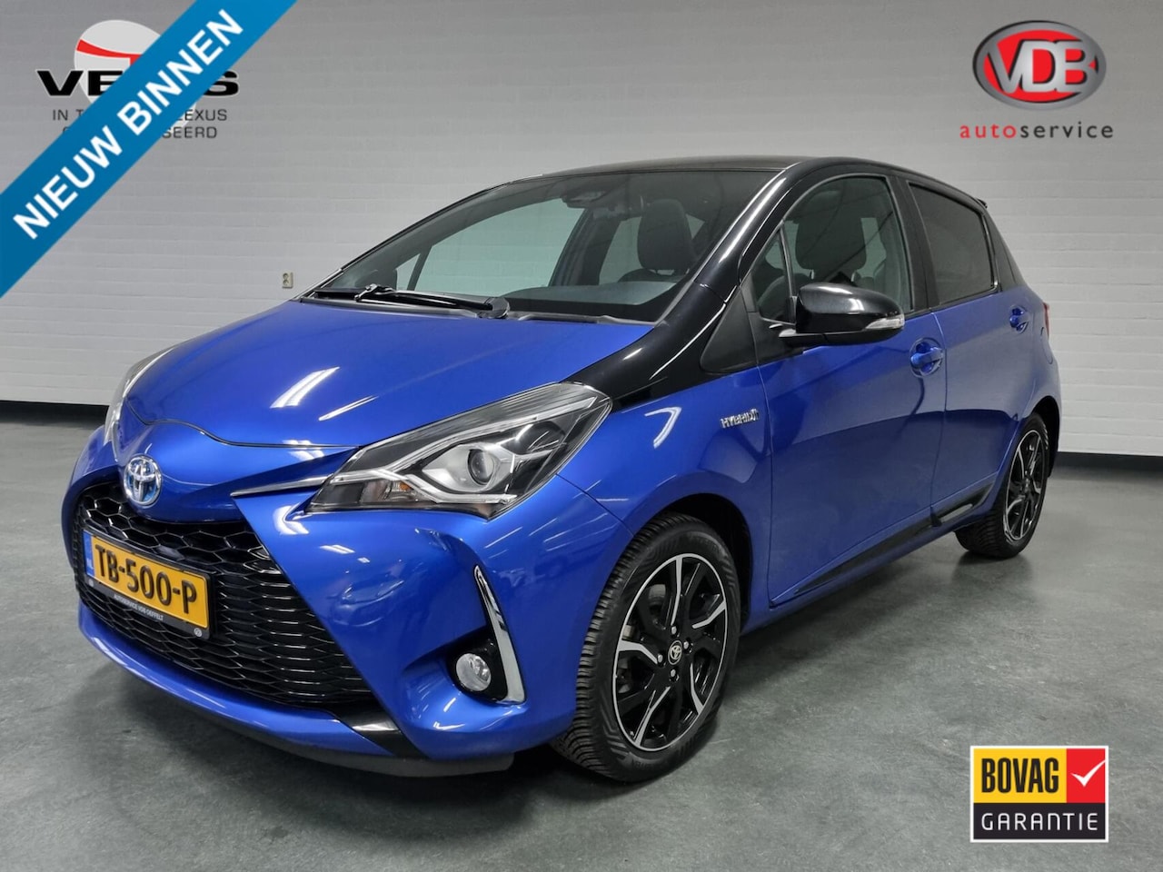 Toyota Yaris - 1.5 Hybrid Bi-Tone / Pano / Trekhaak - AutoWereld.nl