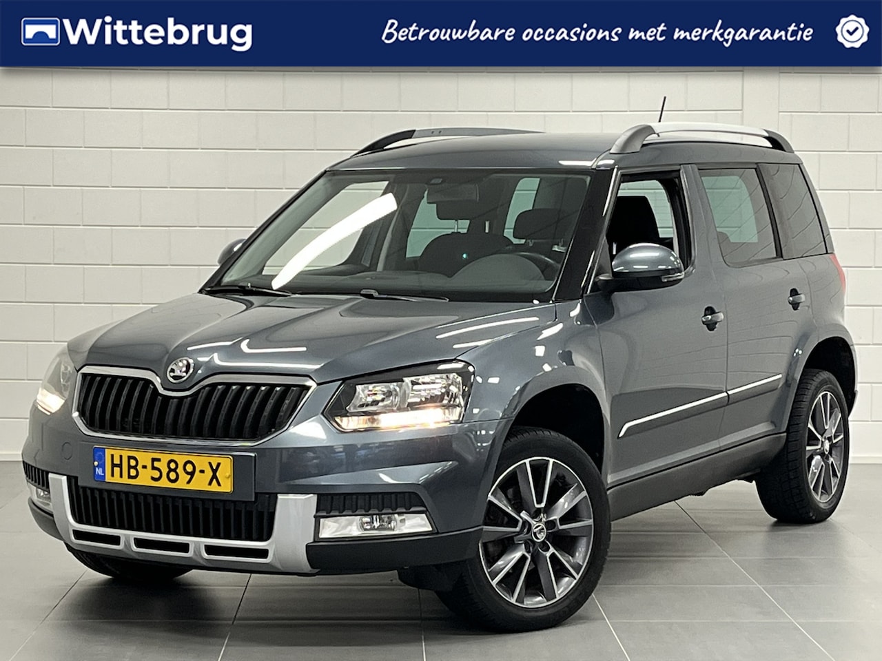 Skoda Yeti Outdoor - 1.2 TSI Greentech Edition NAVIGATIE | LICHTMETALEN VELGEN | PARKEERSENSOREN | STOERE AUTO - AutoWereld.nl