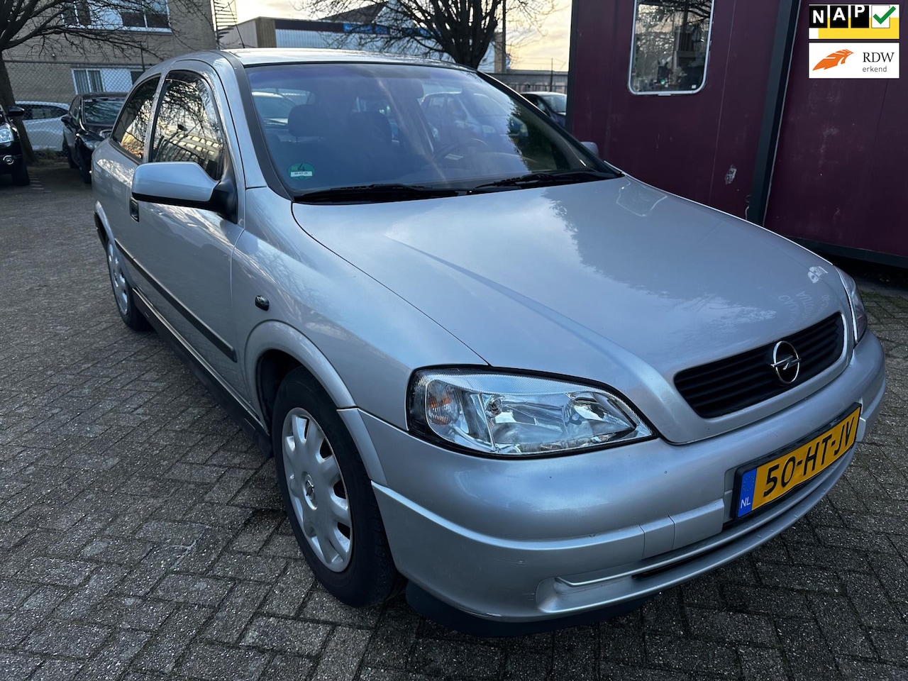 Opel Astra - 1.6 Comfort 1.6 Comfort,airco,nap,Parkeer sensor,trekhaak - AutoWereld.nl