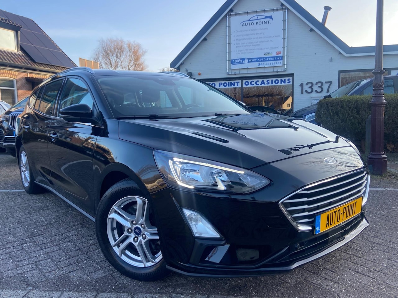 Ford Focus Wagon - 1.0 NAVI/CRUISE/CARPLAY/LANE/PDC/BTW - AutoWereld.nl