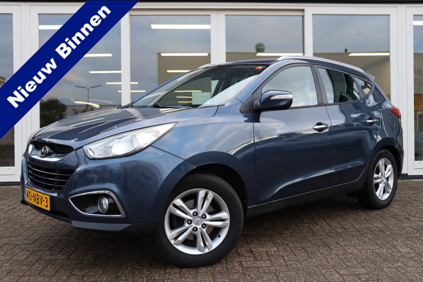 Hyundai ix35 - 2.0i Style 2.0i Style, Cruise Control, Airco, Trekhaak, PDC A, Prijs Is Rijklaar Inclusief 6 Maanden - AutoWereld.nl