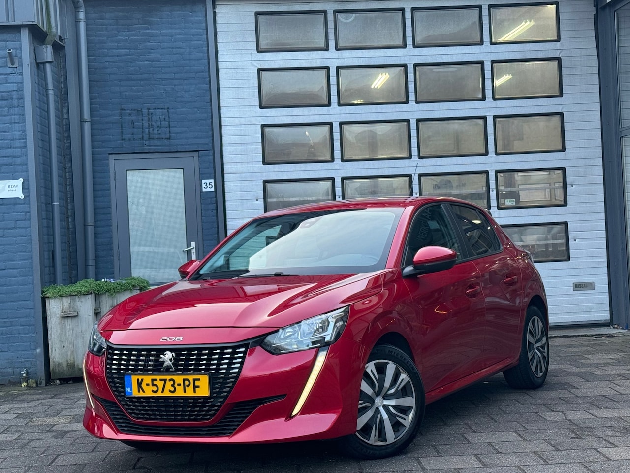 Peugeot 208 - 1.2 PureTech Blue Lease Allure | Navi | Camera | Cruise - AutoWereld.nl