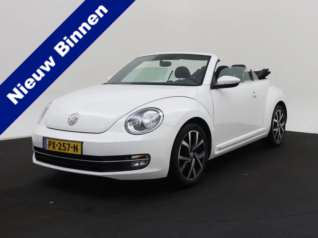 Volkswagen Beetle Cabriolet - 1.2 TSI Trend BlueMotion (2-drs Softtop)  12-2013 76.958 KM - AutoWereld.nl