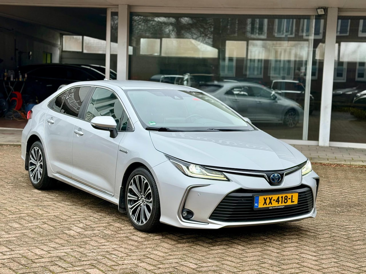 Toyota Corolla - 1.8 Hybrid Style|Nieuwstaat|Origineel Nederlands|Nav|Camera|Trekhaak - AutoWereld.nl