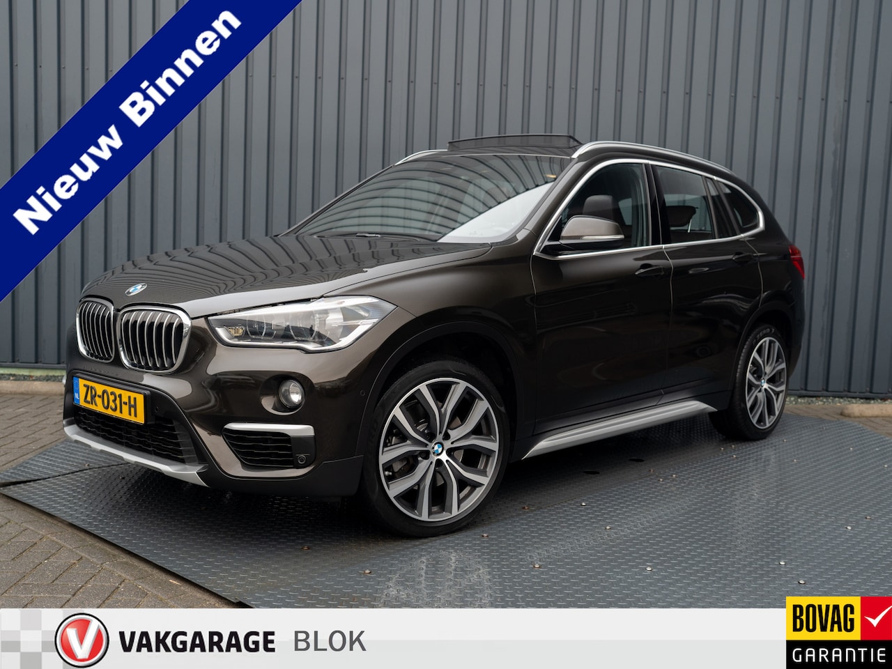 BMW X1 - sDrive20i High Executive | Trekhaak afnb. | Panodak | Head Up | Camera | Elk. A-klep | Led - AutoWereld.nl
