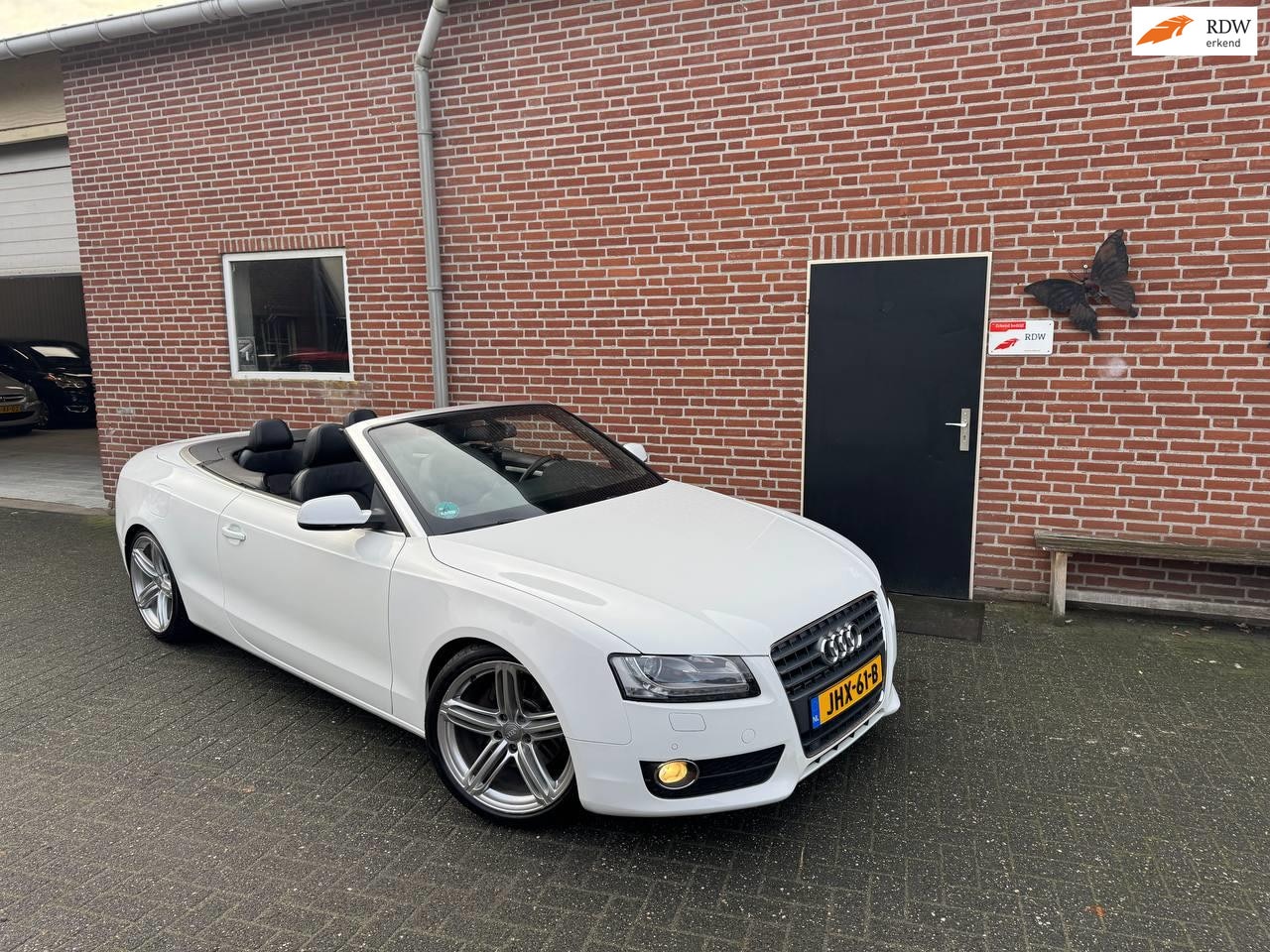 Audi A5 Cabriolet - Youngtimer 2.0 TFSI Stoelverwarming, Navi , S line 19 inch - AutoWereld.nl