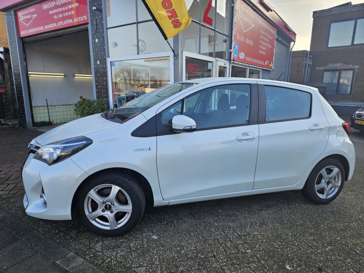 Toyota Yaris - 1.5 Hybrid Lease/Nav/Camera/automaat - AutoWereld.nl