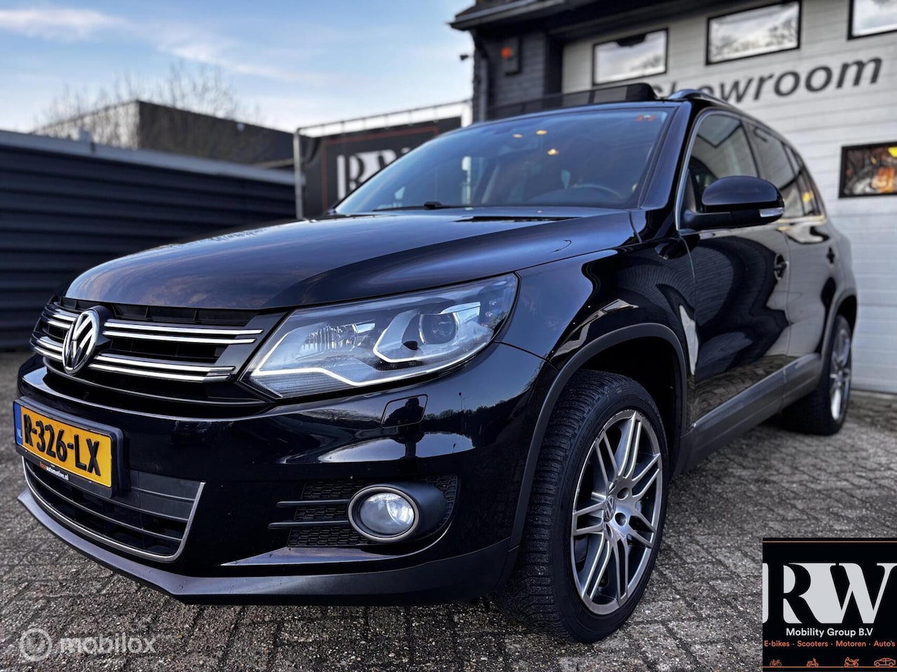 Volkswagen Tiguan - 1.4 TSI Sport&Style 4Motion *PANO*CRUISE* - AutoWereld.nl