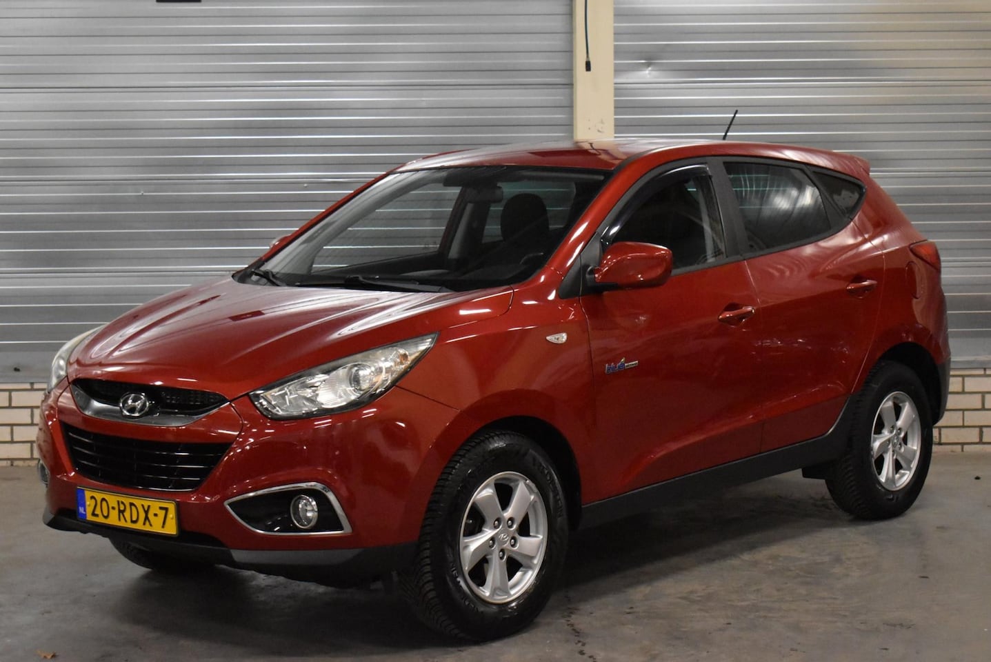 Hyundai ix35 - 1.6i GDI Dynamic + Parkeersensoren|Trekhaak|Cruise Control|Climate Control| - AutoWereld.nl