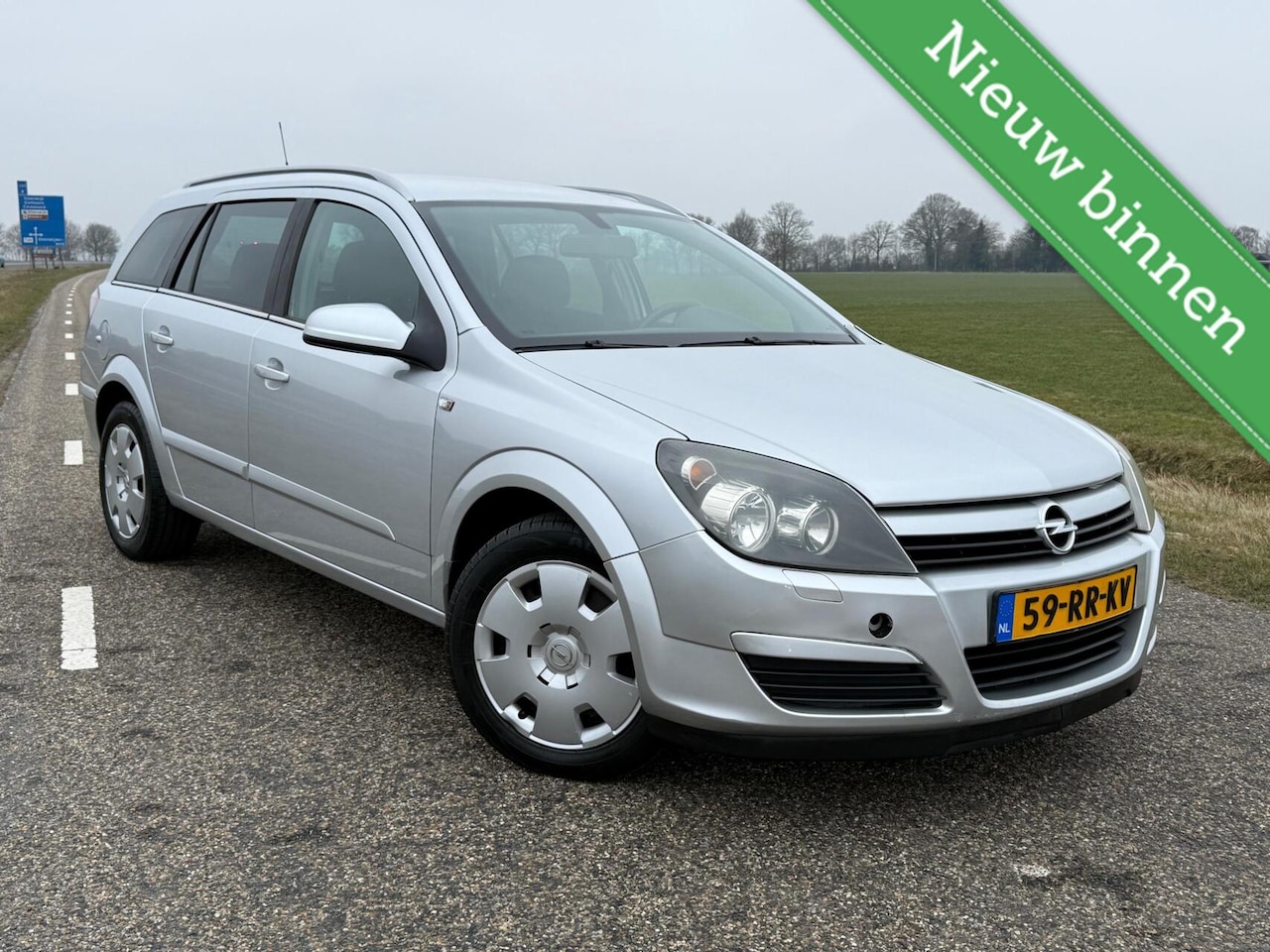 Opel Astra Wagon - 1.6 Enjoy 105pk | Airco | Trekh - AutoWereld.nl