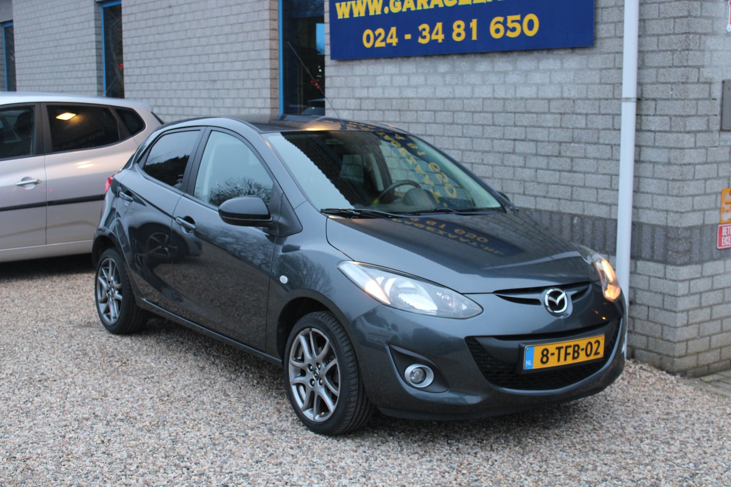Mazda 2 - 1.3 TS Plus navi weinig km - AutoWereld.nl