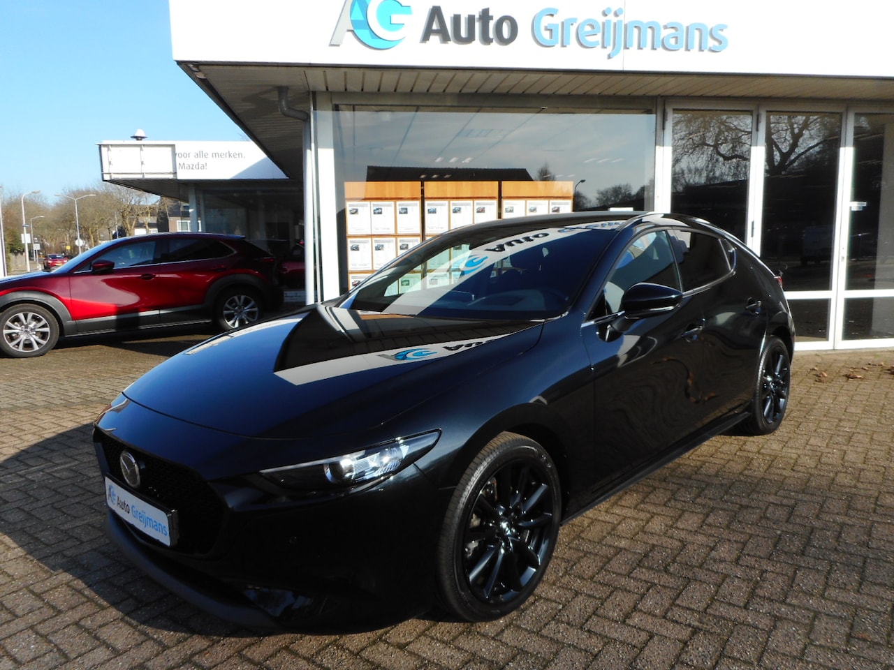 Mazda 3 - 2.0 e-SkyActiv-G M Hybrid 122 Homura - AutoWereld.nl