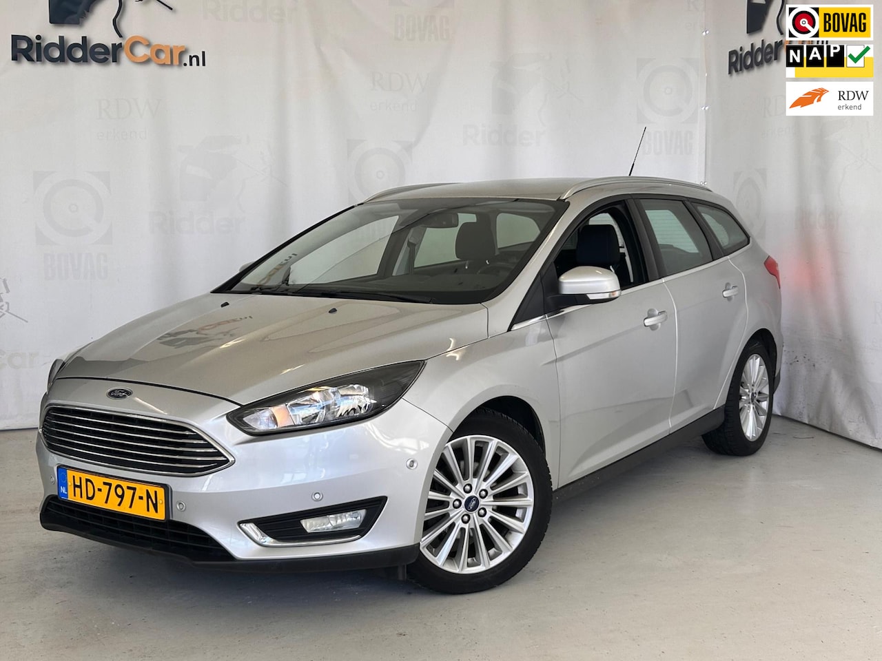 Ford Focus Wagon - 1.0 Titanium Edition|NAP|NAVI|CRUISE|AIRCO|PARKSENS| - AutoWereld.nl