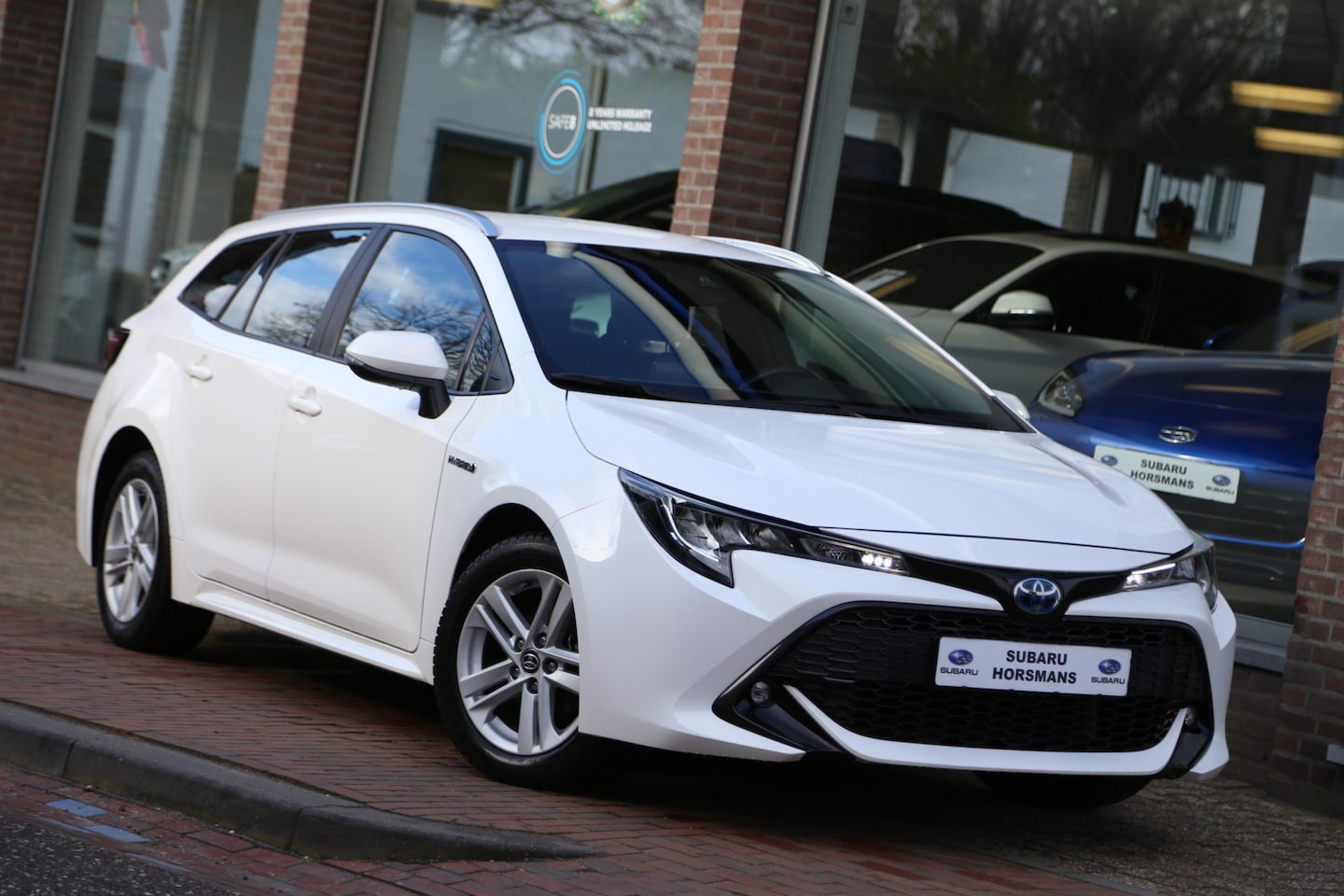 Toyota Corolla Touring Sports - 1.8 Hybrid Active Navi Camera LED ACC - AutoWereld.nl