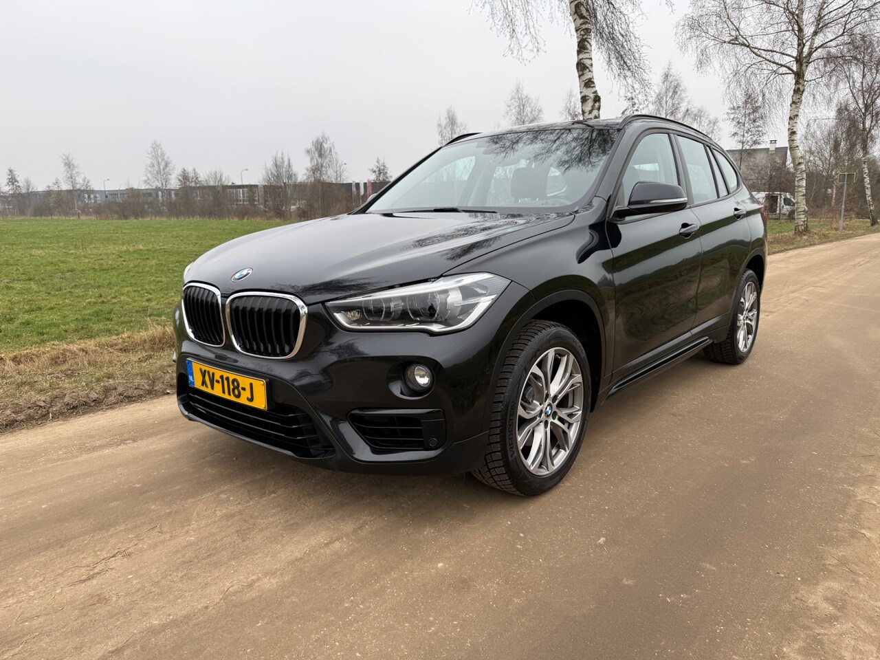 BMW X1 - sDrive18i Executive Edition | NED AUTO | HUD | PANORAMADAK | HOGE INSTAP | - AutoWereld.nl