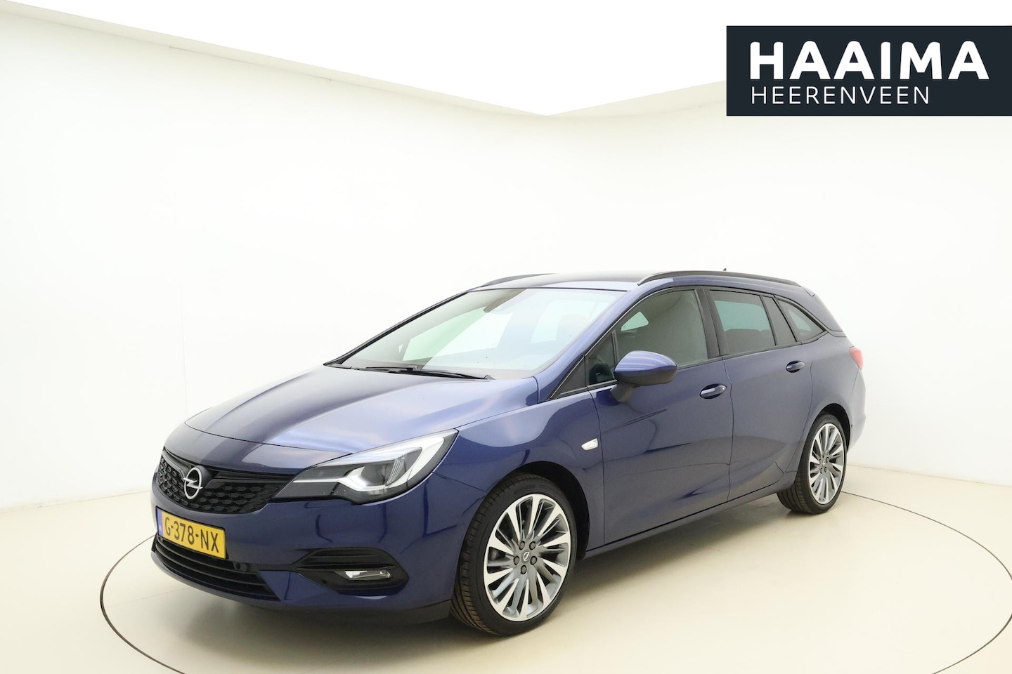 Opel Astra Sports Tourer - 1.2 Turbo 110pk Launch Edition | Alcantara bekleding | Trekhaak | Navigatie | Camera | Cli - AutoWereld.nl