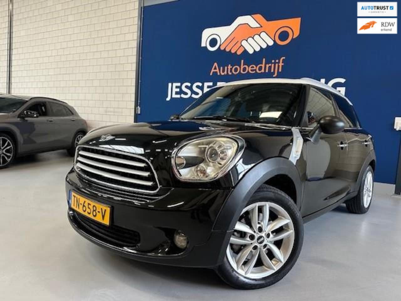 MINI Countryman - Mini 1.6 Cooper / bj.2010 / kleur: zwart / climate /cruise / sportvelgen / etc./ APK 01/20 - AutoWereld.nl