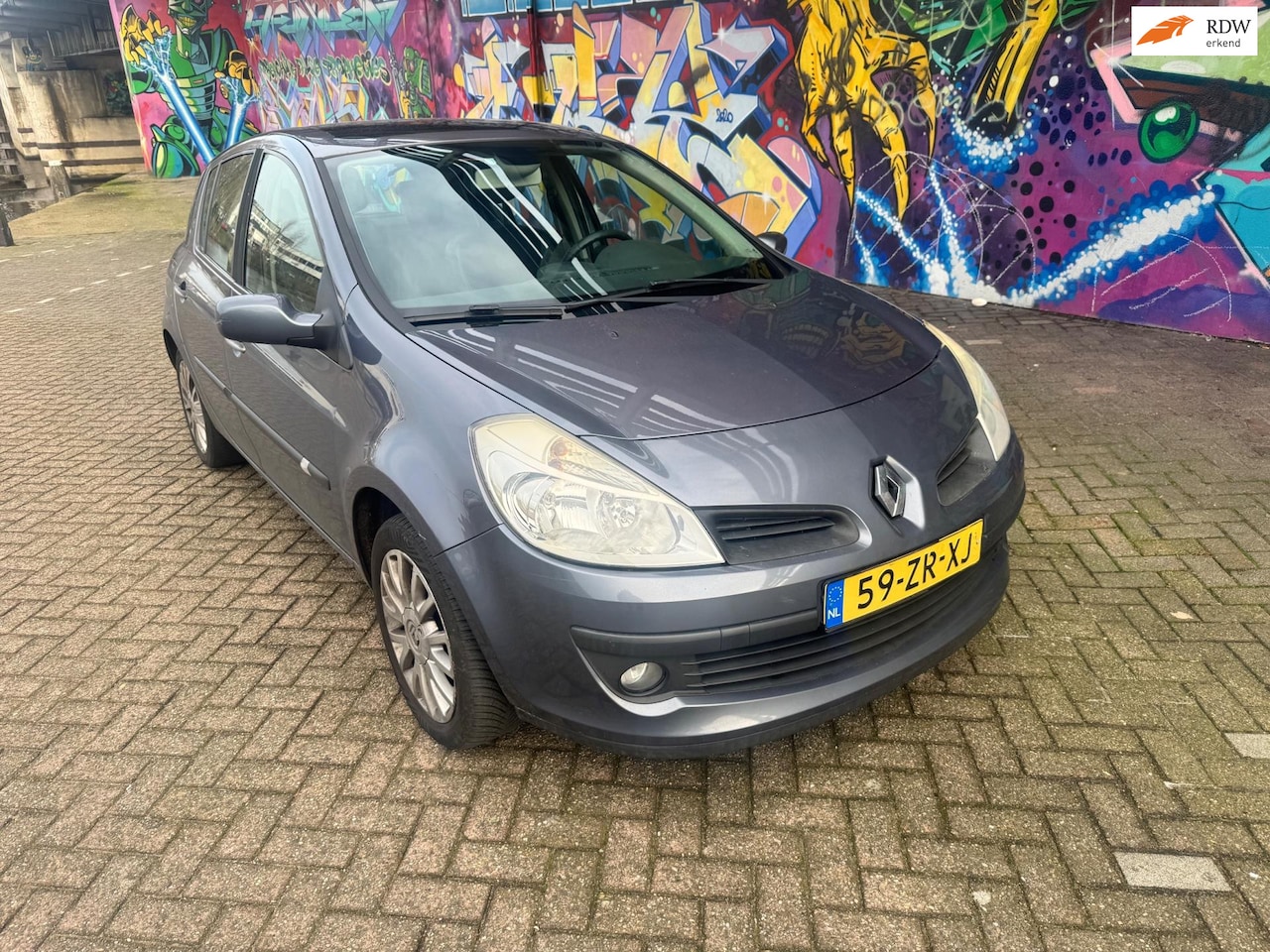Renault Clio - 1.6-16V Dynamique S panorama dak digitale airco cruise controle boeken aanwezig zeer nette - AutoWereld.nl