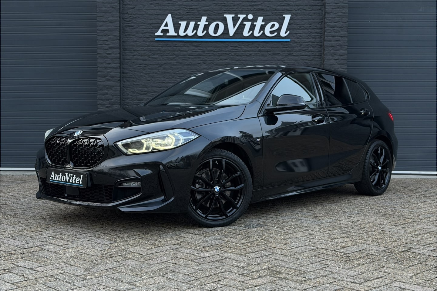 BMW 1-serie - 118i M-Sport | Stoelverwarming | Live Cockpit Prof. | Carplay | PDC V & A - AutoWereld.nl