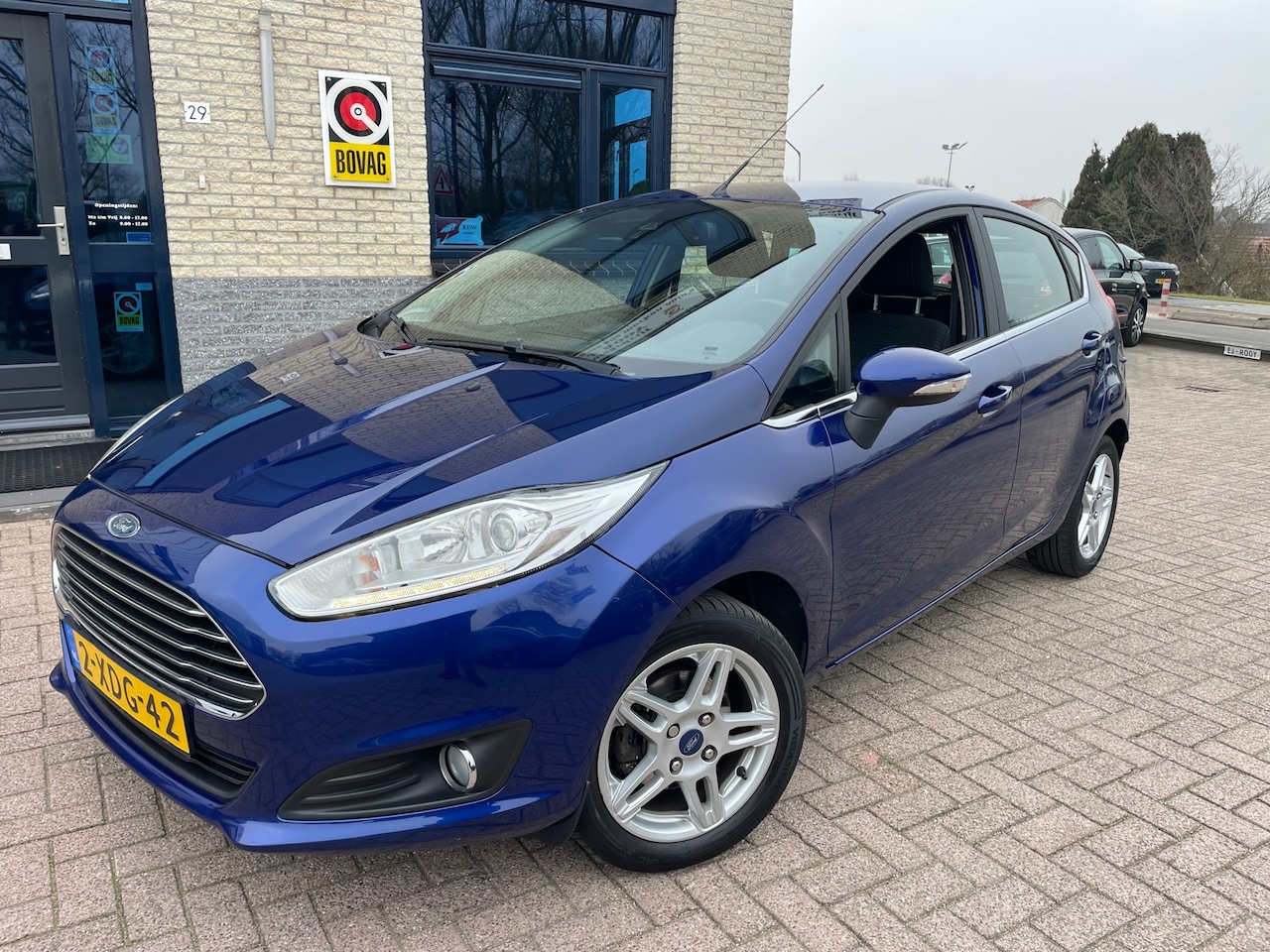 Ford Fiesta - 1.0 EcoBoost Titanium-pdc-navi-bluetooth - AutoWereld.nl