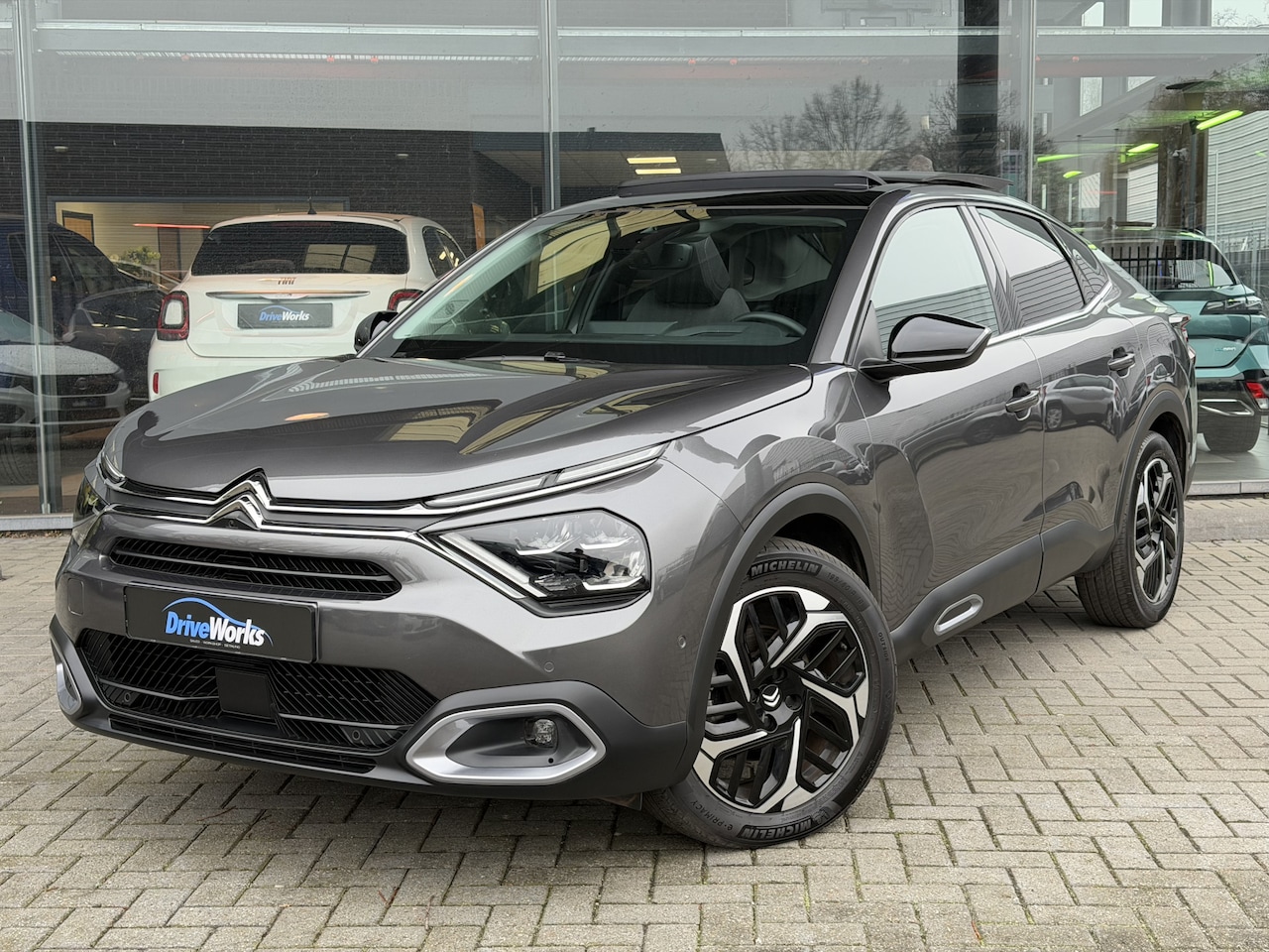 Citroën C4 X - 1.2 Puretech Shine | Pano | Head-up | Adaptive Cruise| LEER | Carplay | Full options | Int - AutoWereld.nl